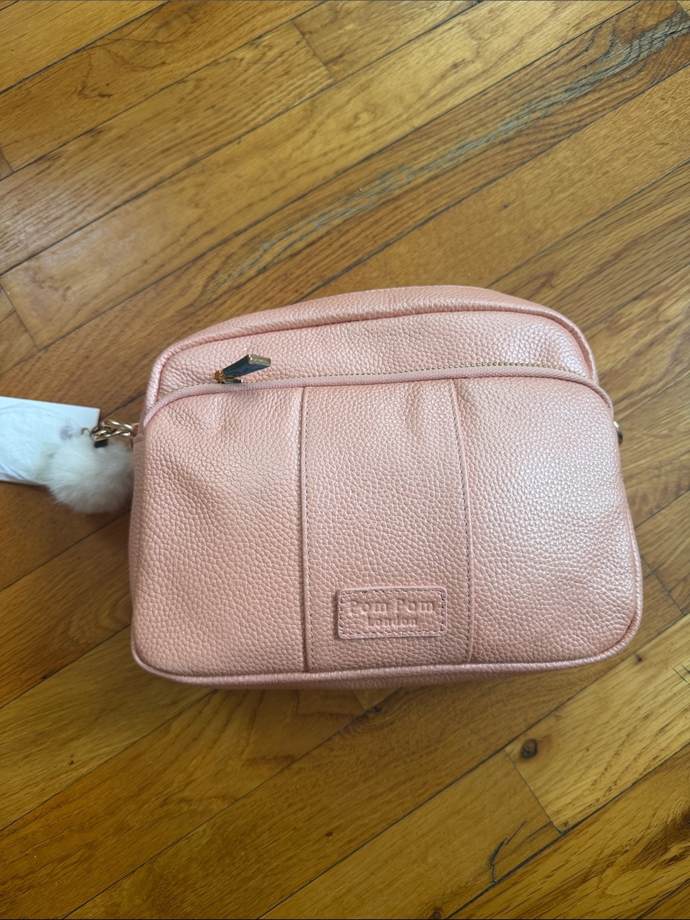 Pom Pom Pebbled Crossbody Bag in Blush Pink
